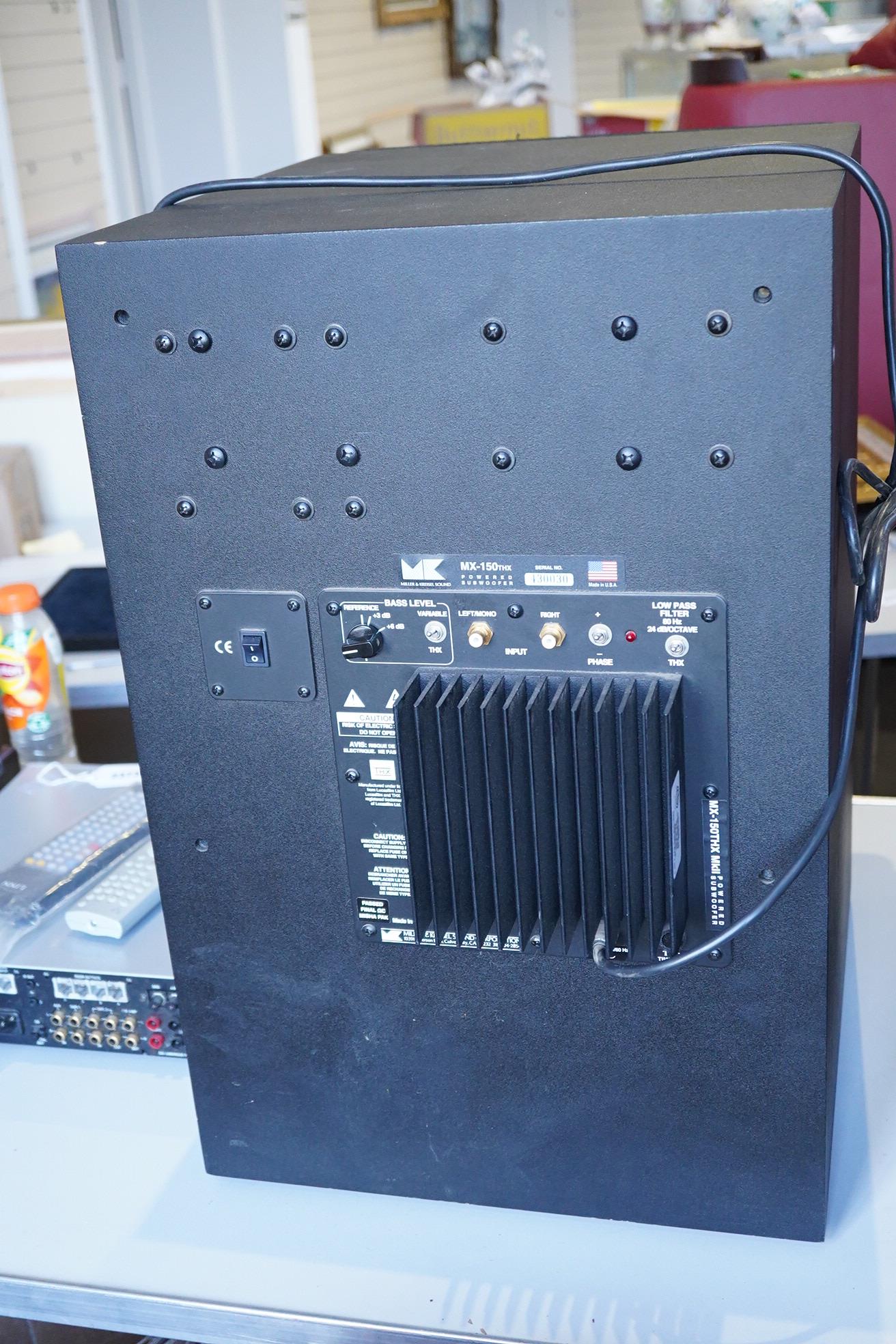 A Miller & Kreisel Sound MX-150THX Mk.II powered subwoofer bass speaker, serial number 430030, 59cm high, 39cm wide, 46cm deep